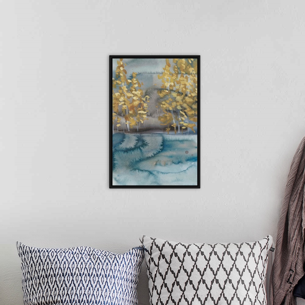 A bohemian room featuring Abstract watercolor landscape in blue and gray with golden trees.