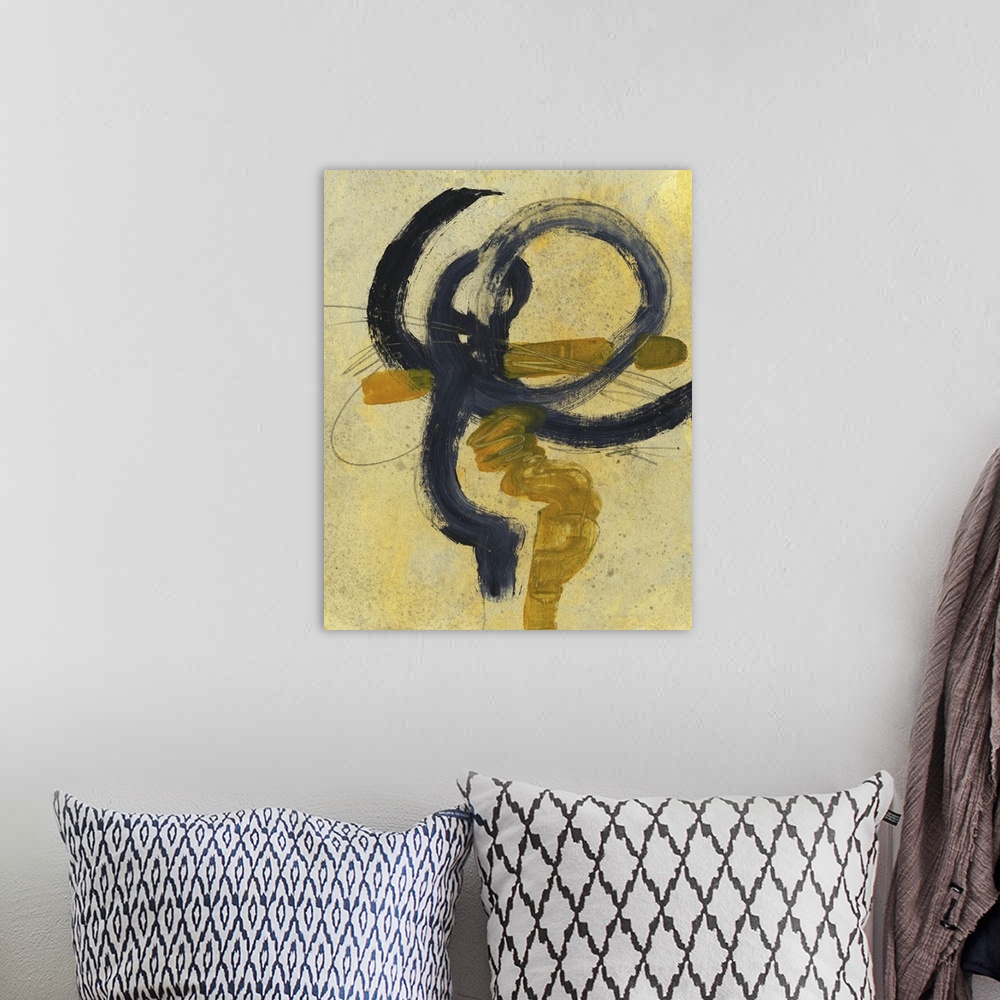 A bohemian room featuring Abstract painting using golden tones with an overlay of bold black lines in circular motions.