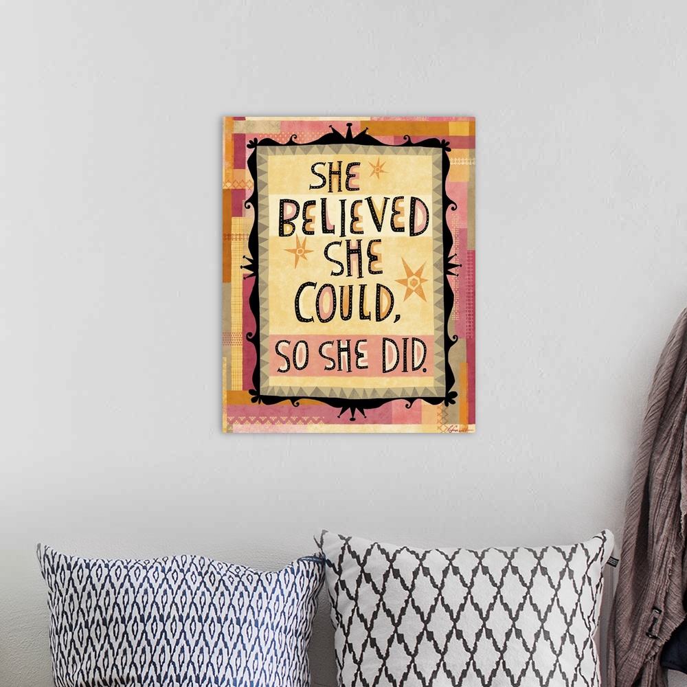 A bohemian room featuring Contemporary artwork with a retro feel of motivational text against a colorful background.