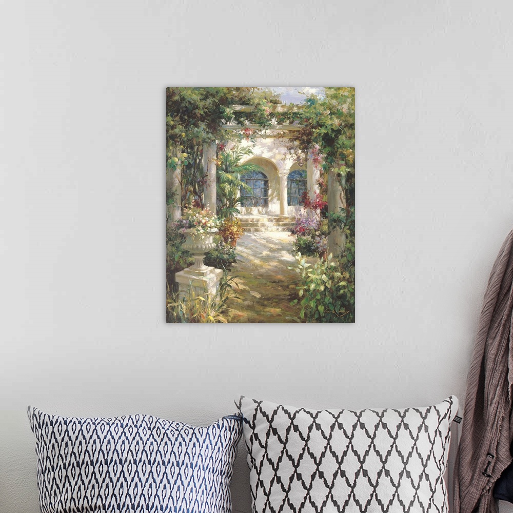 A bohemian room featuring Painting of a shady courtyard with arches and columns.