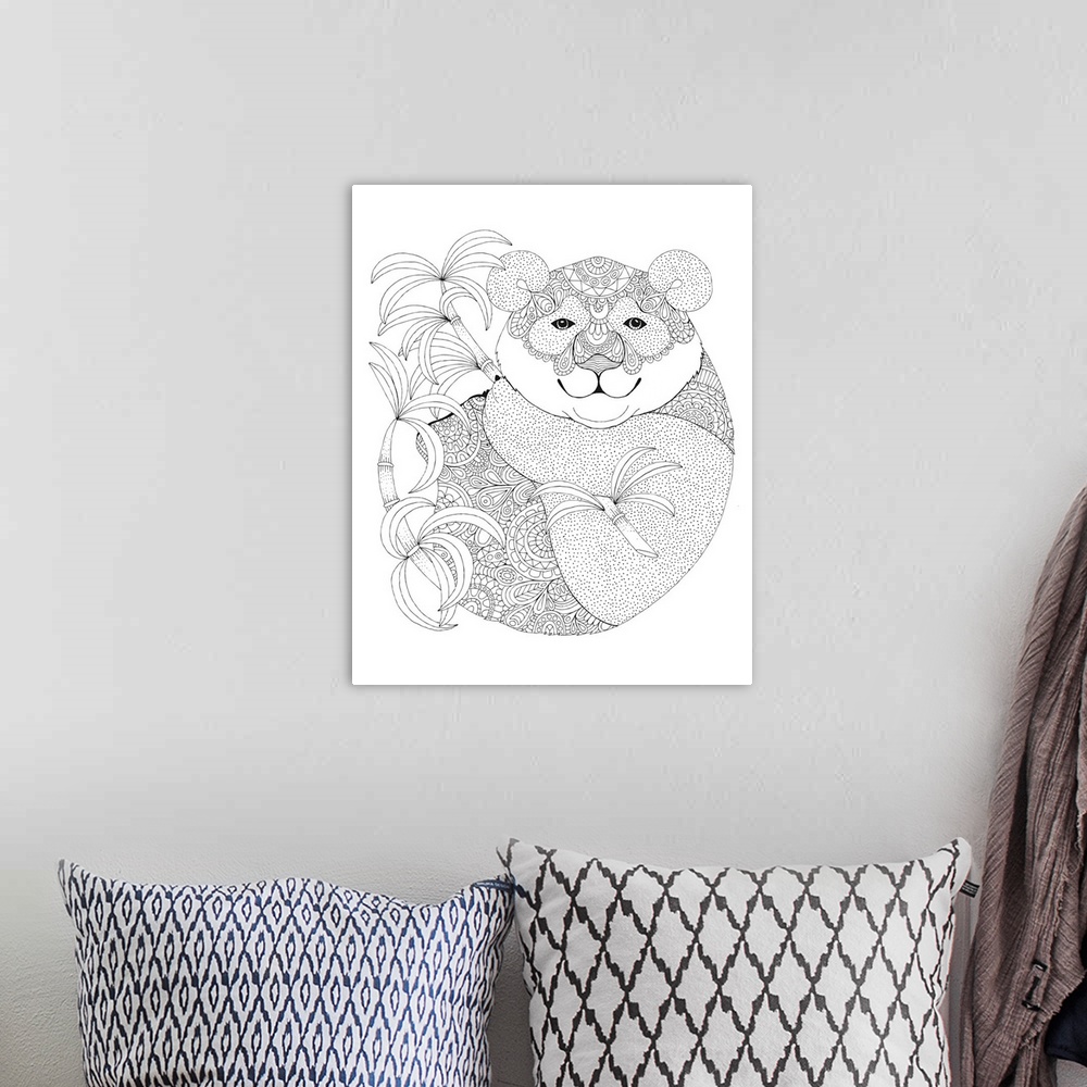 A bohemian room featuring Black and white line art of a uniquely  designed koala bear with bamboo.