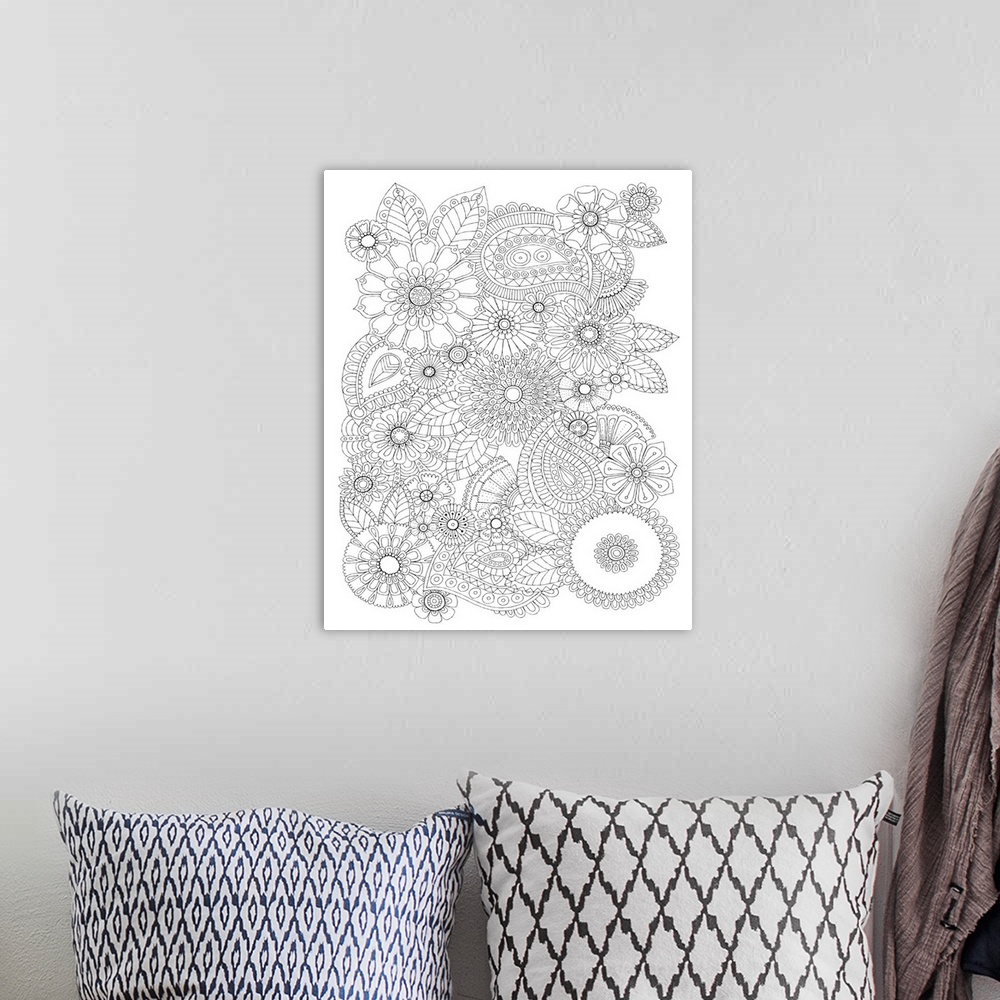 A bohemian room featuring Black and white line art of intricately designed flowers.