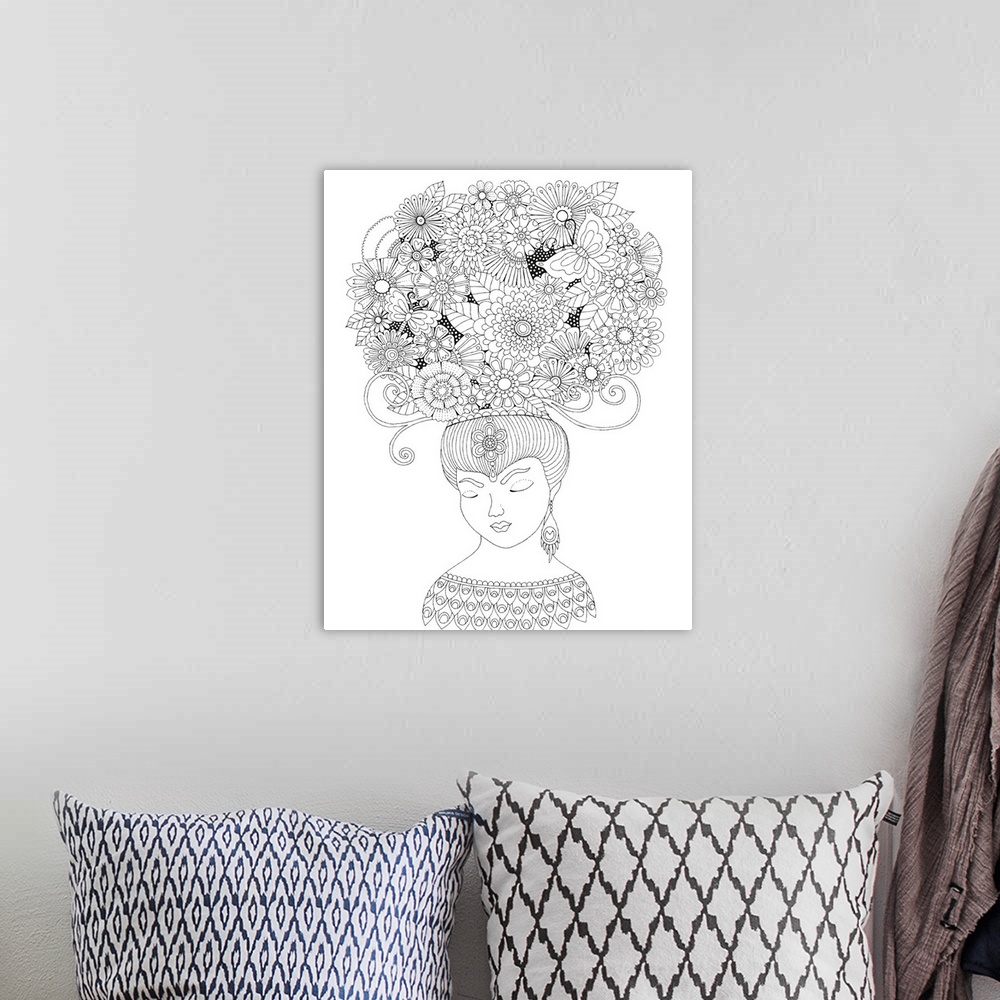 A bohemian room featuring Black and white line art of a woman with her eyes closed and a giant bouquet of flowers on her head.