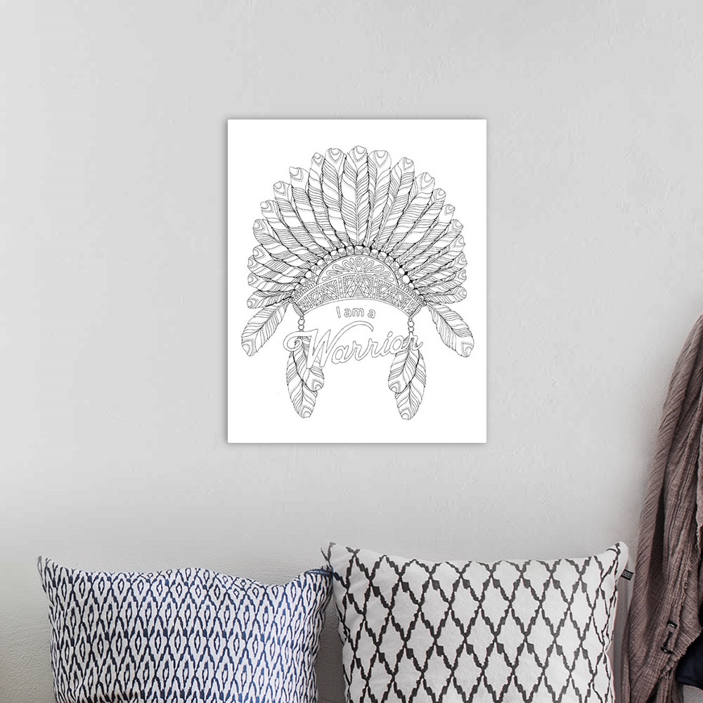 A bohemian room featuring Black and white line art of a feathered headdress and the phrase "I am a Warrior" written below it.