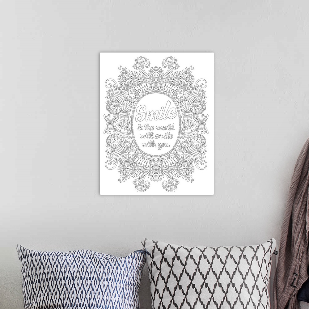 A bohemian room featuring Inspirational black and white line art with the phrase "Smile and the world will smile with you" ...