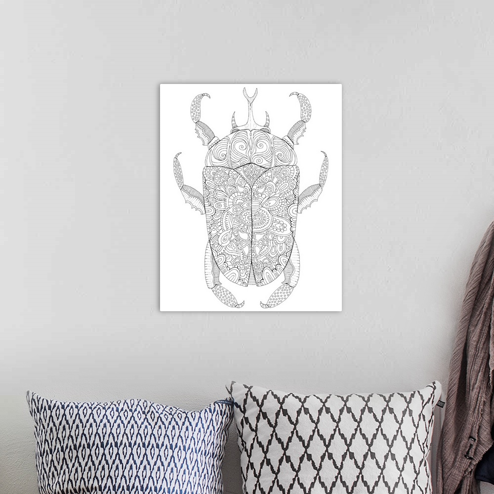 A bohemian room featuring Black and white line art of an intricately designed beetle.