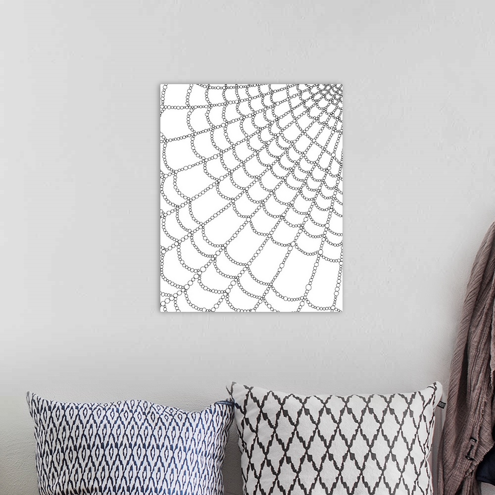 A bohemian room featuring Black and white line art of a close-up of a spider web made out of little circles.