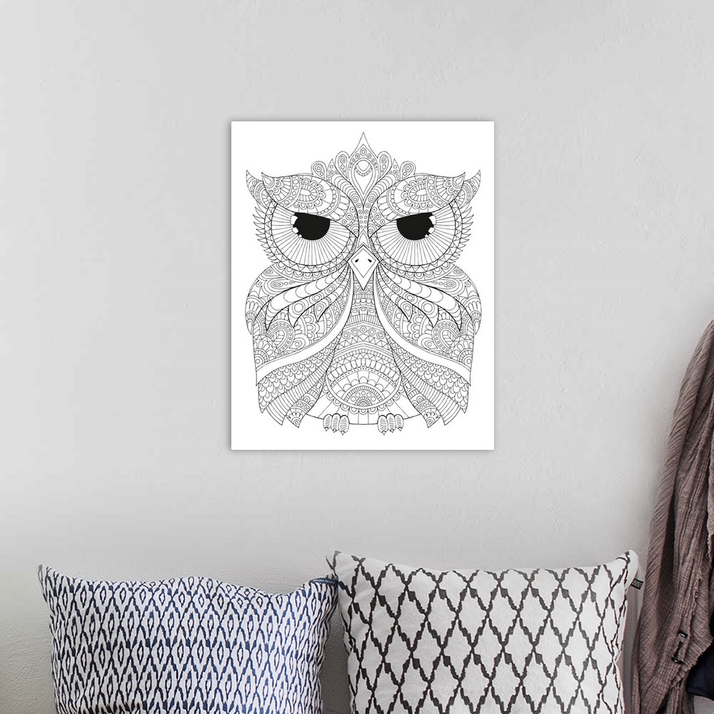 A bohemian room featuring Black and white line art of a uniquely designed owl.