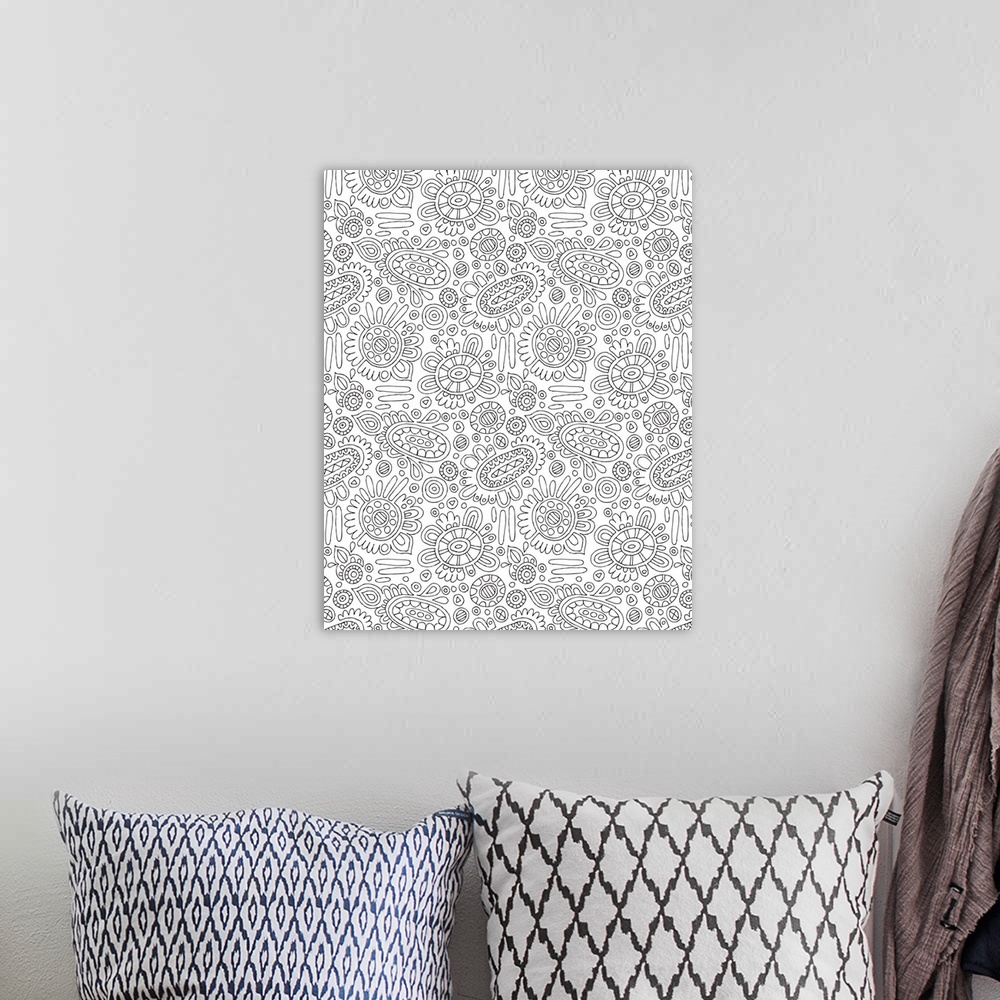 A bohemian room featuring Black and white line art of an intricate floral pattern.