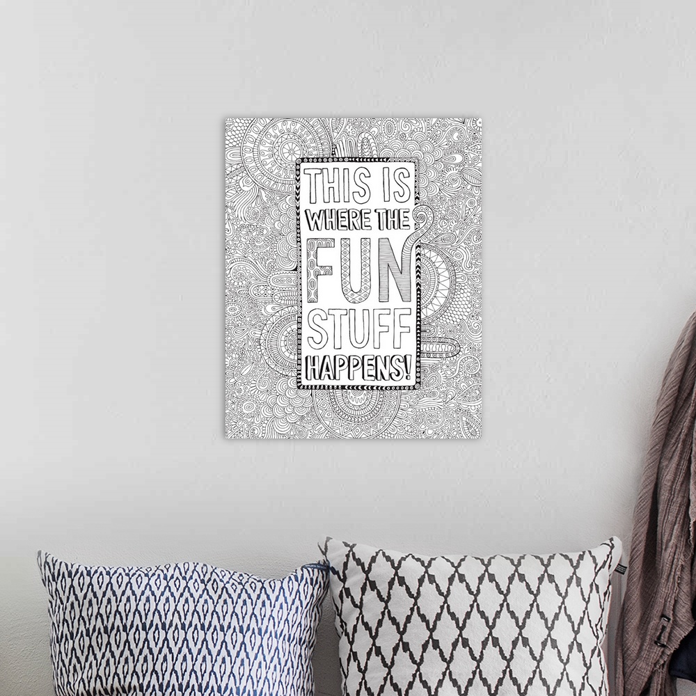A bohemian room featuring Black and white line art with the phrase "This is Where The Fun Stuff Happens!" written in a box ...