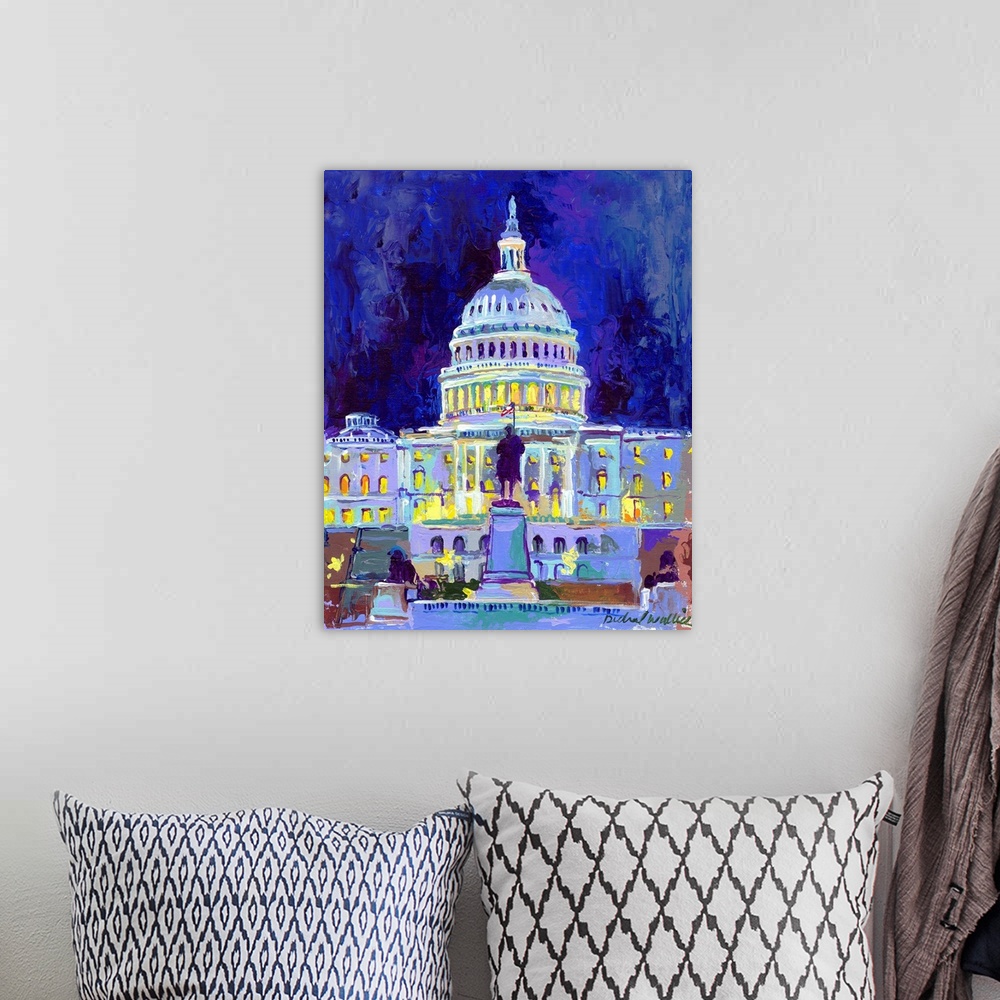 A bohemian room featuring Painting of the nations capitol building lit up at night.
