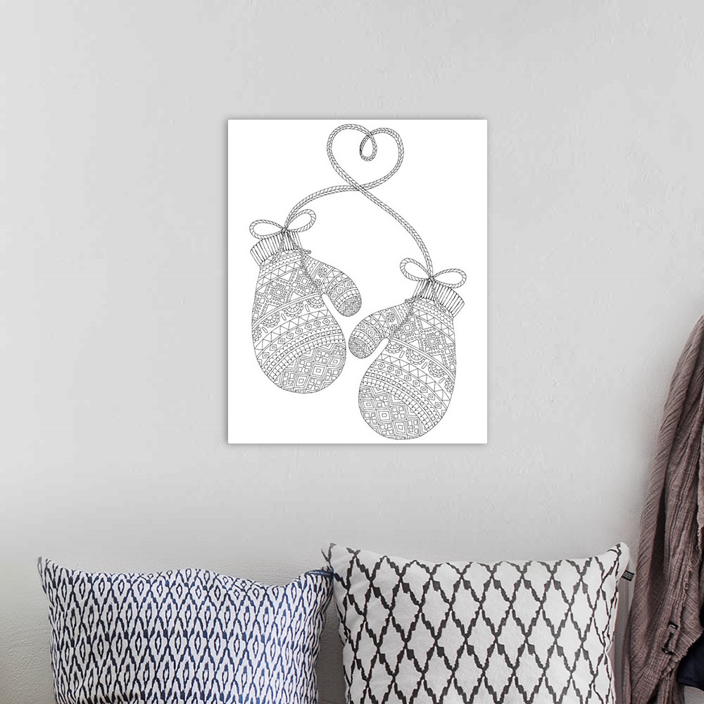 A bohemian room featuring Black and white line art of a pair of patterned mittens.