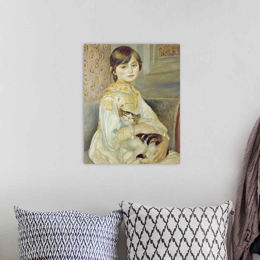 A bohemian room featuring Classic artwork of a small girl as she sits on a couch with her hands wrapped around the cat on h...