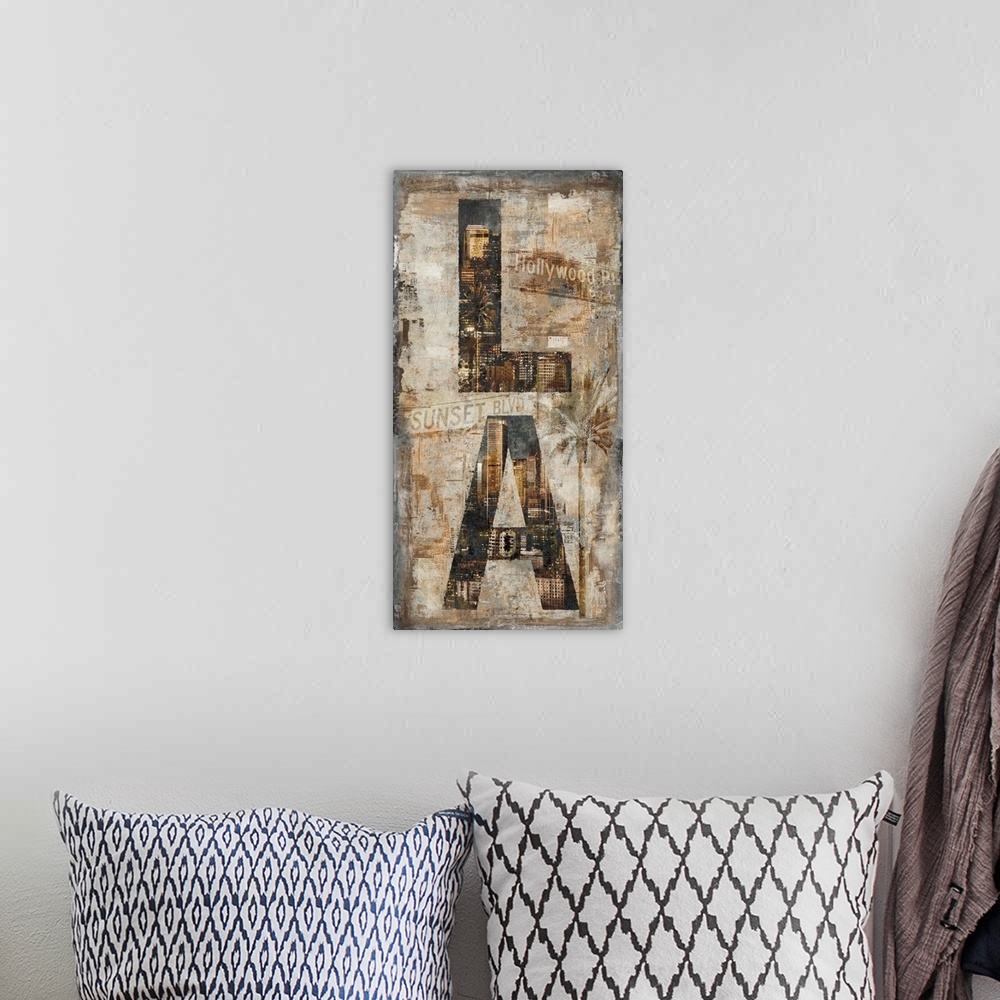 A bohemian room featuring Rustic sign with LA written vertically with the skyline in the letters and street signs and a pal...