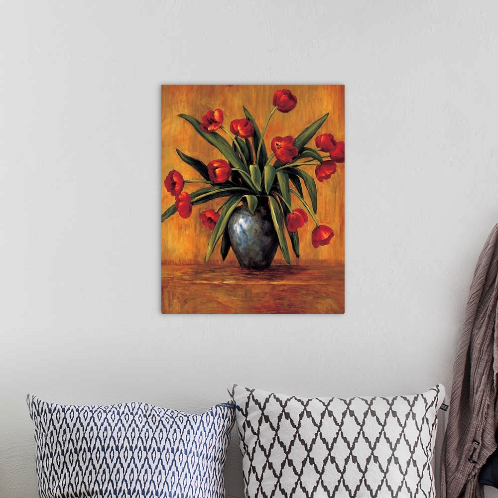A bohemian room featuring Contemporary painting of red tulips in a vase with an orange, red, and brown background.