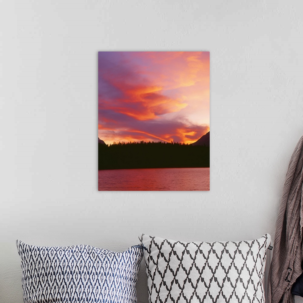 A bohemian room featuring Canada, Alberta, Banff National Park, sunset over Mount Bosworth and Herbert Lake..