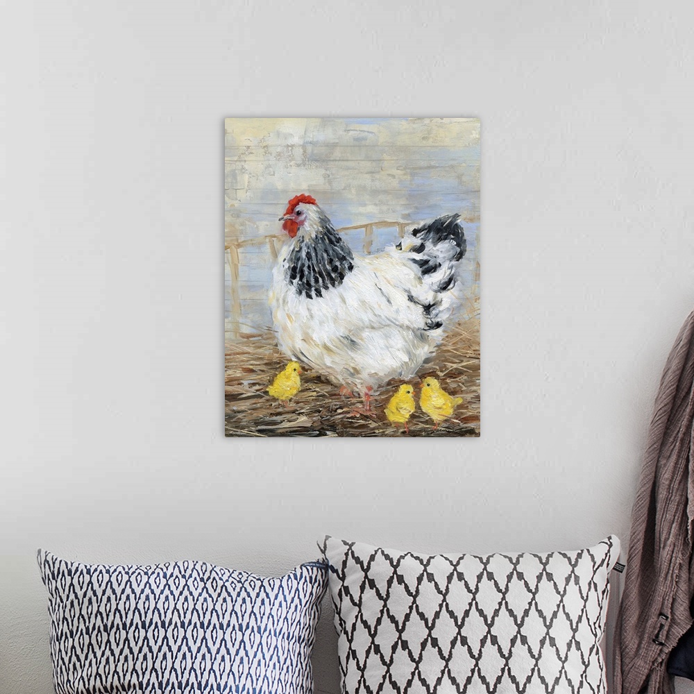 A bohemian room featuring A contemporary painting of a farmhouse chicken with three yellow chicks.