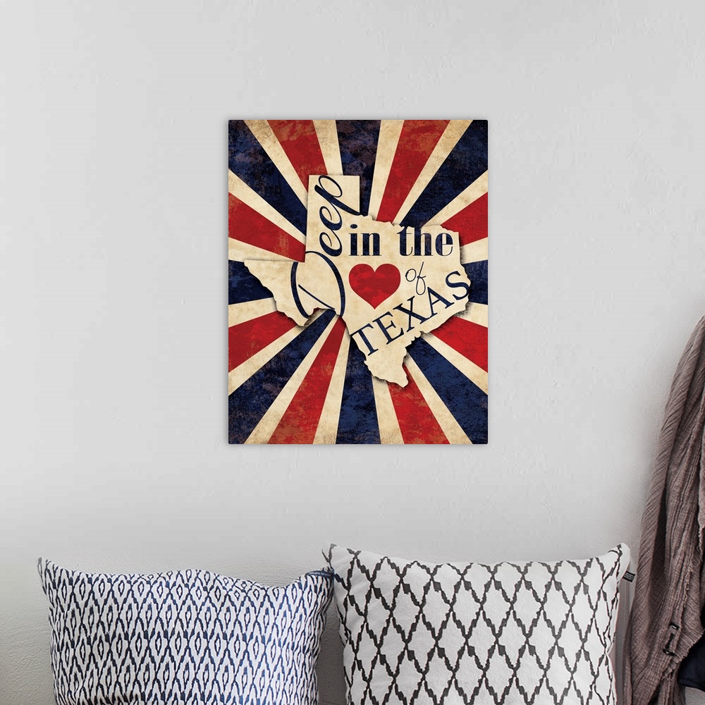 A bohemian room featuring "Deep in the Heart of Texas" written on the state of Texas with a red, white, and blue lined back...