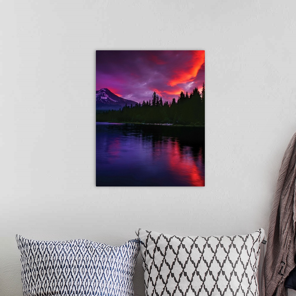 A bohemian room featuring Fiery sunset illuminating the clouds above Mount Hood.