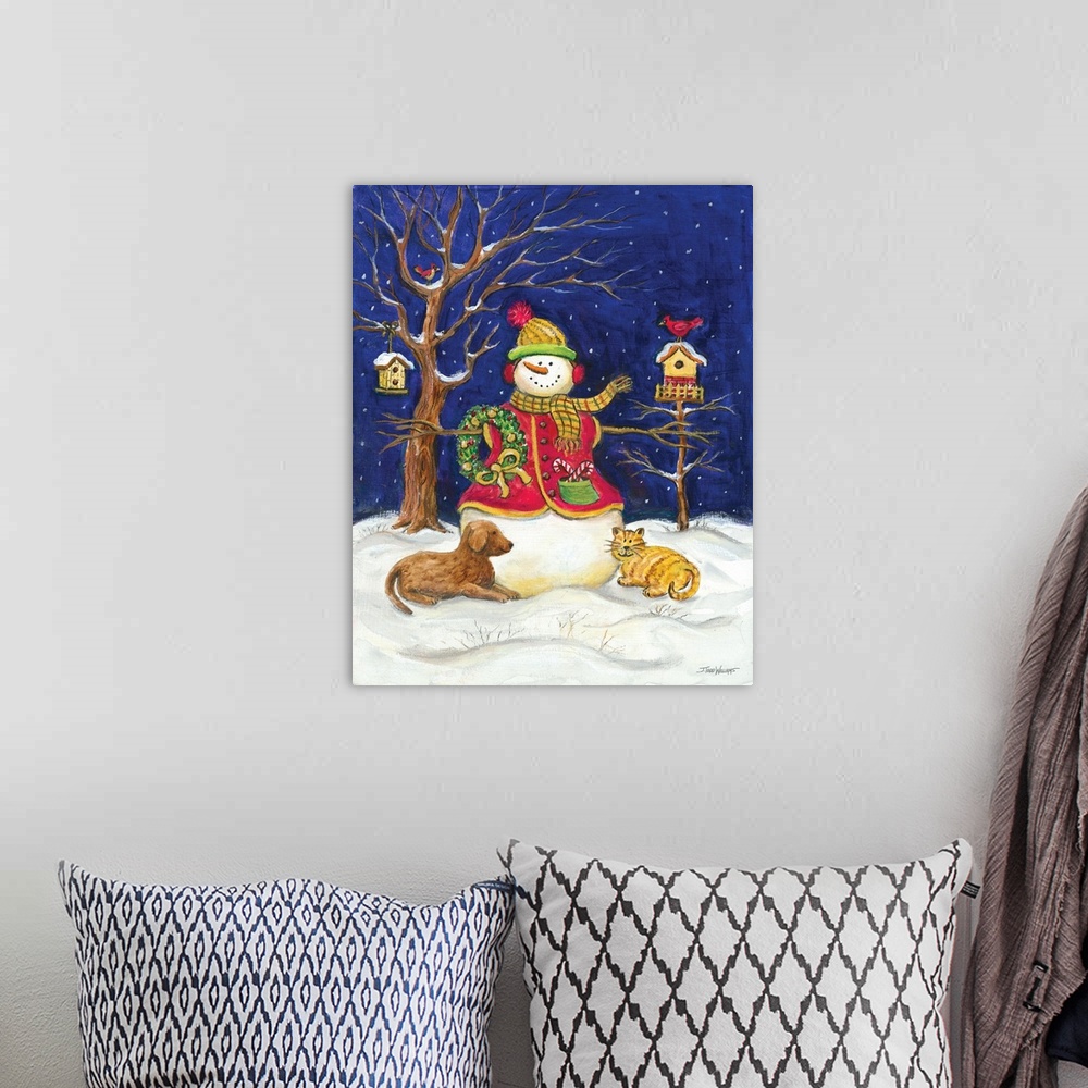 A bohemian room featuring Winter decor with a snowman wearing a red sweater and a wreath hanging on his arm with a cat and ...