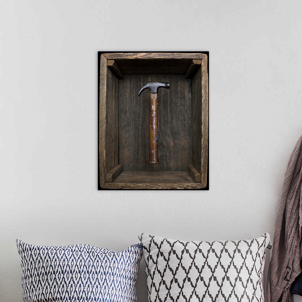 A bohemian room featuring Antique hammer floating in old box