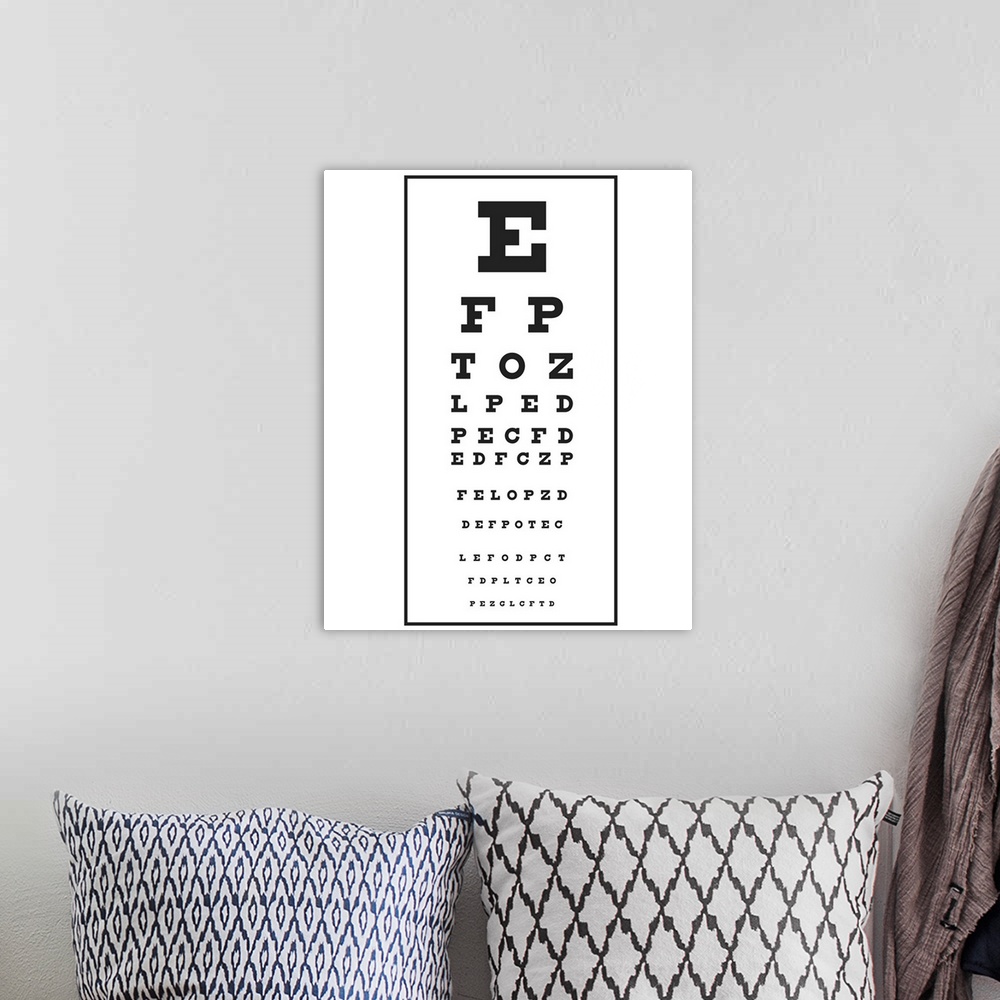 A bohemian room featuring Black and white illustration of Snellen chart