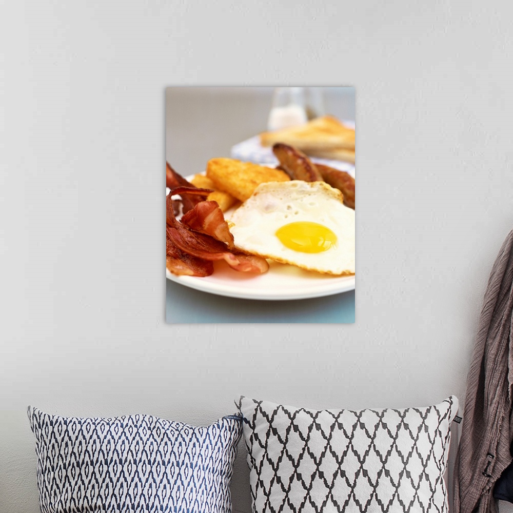 A bohemian room featuring Eggs, bacon, hashbrown and sausage
