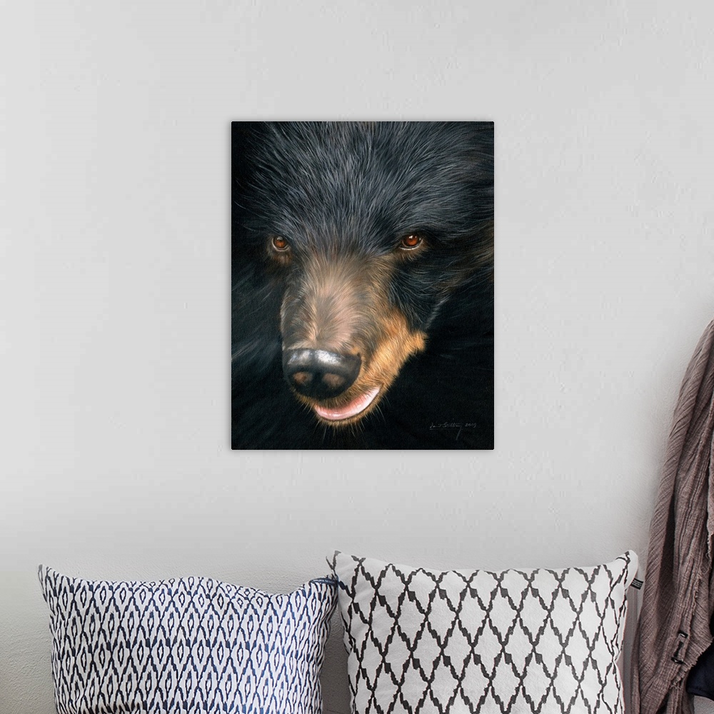 A bohemian room featuring Contemporary painting of a black bear face close-up.