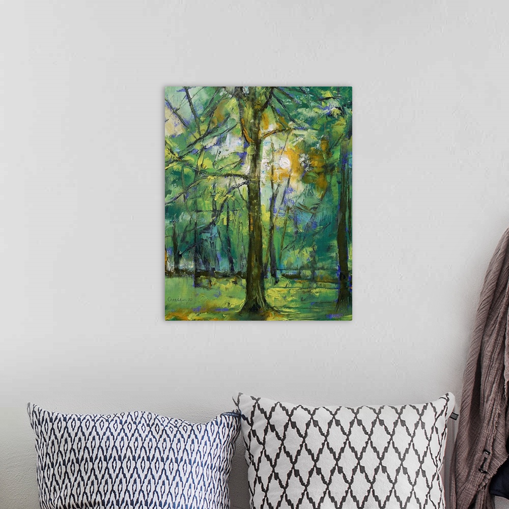 A bohemian room featuring A vertical painting of a tree in a forest illuminated by sunlight shining through leaves.