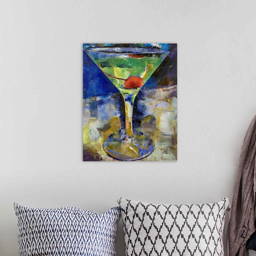 A bohemian room featuring Artwork perfect for the home of a large martini glass filled with a green drink and a cherry sitt...