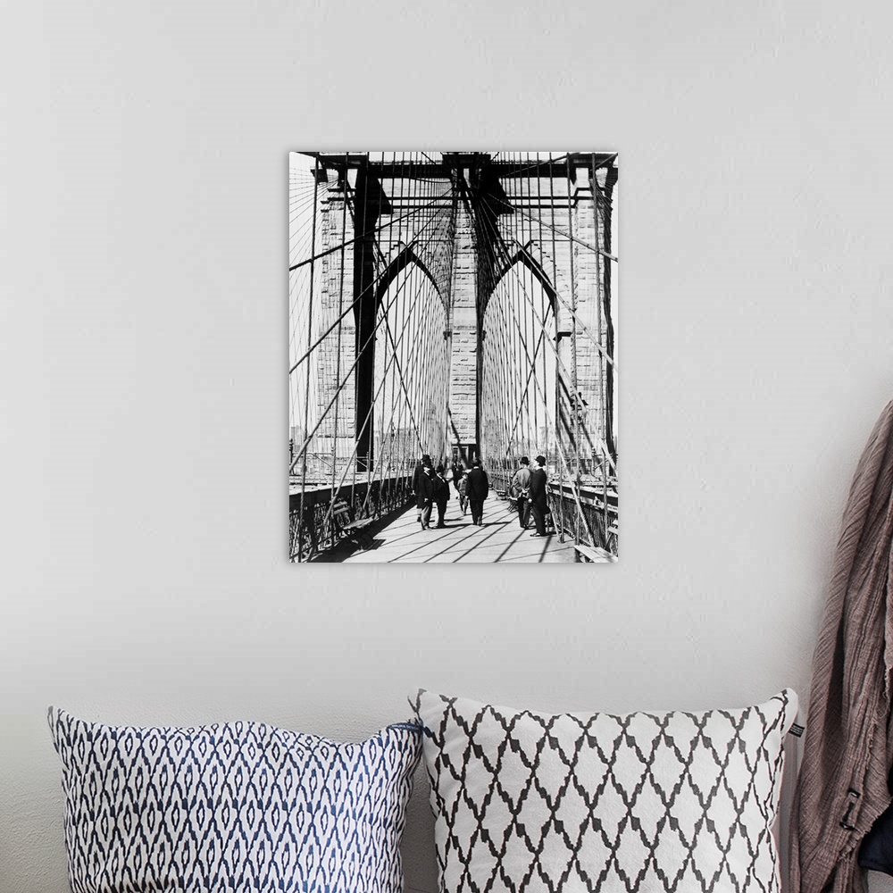 A bohemian room featuring 1800's 1880's Men Standing On Brooklyn Bridge Just After It Opened 1883 New York City USA.