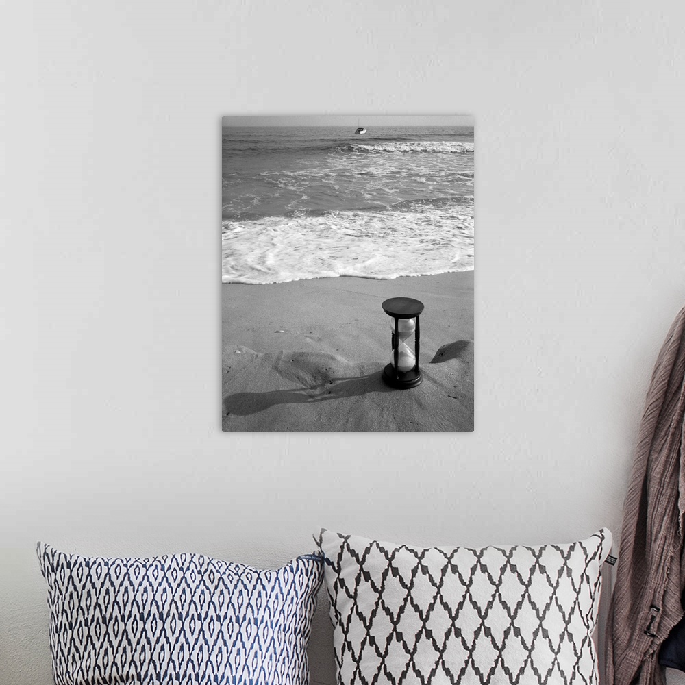 A bohemian room featuring 1960's Still Life Of Hourglass At Edge Of Beach Sand With Waves Washing Up On Shore And Power Boa...