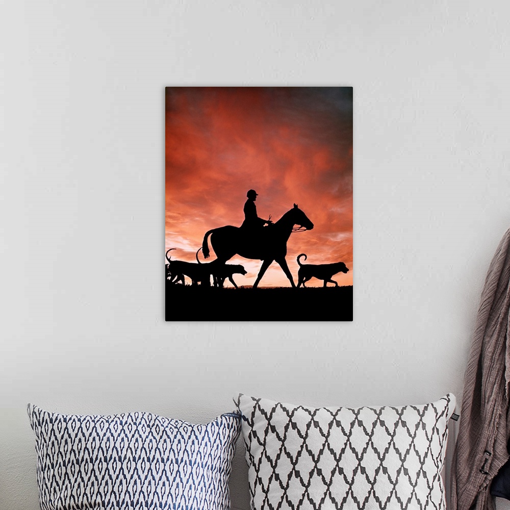 A bohemian room featuring 1970s Silhouetted Anonymous Man Riding Horseback With Foxhound Dogs On Fox Hunt.