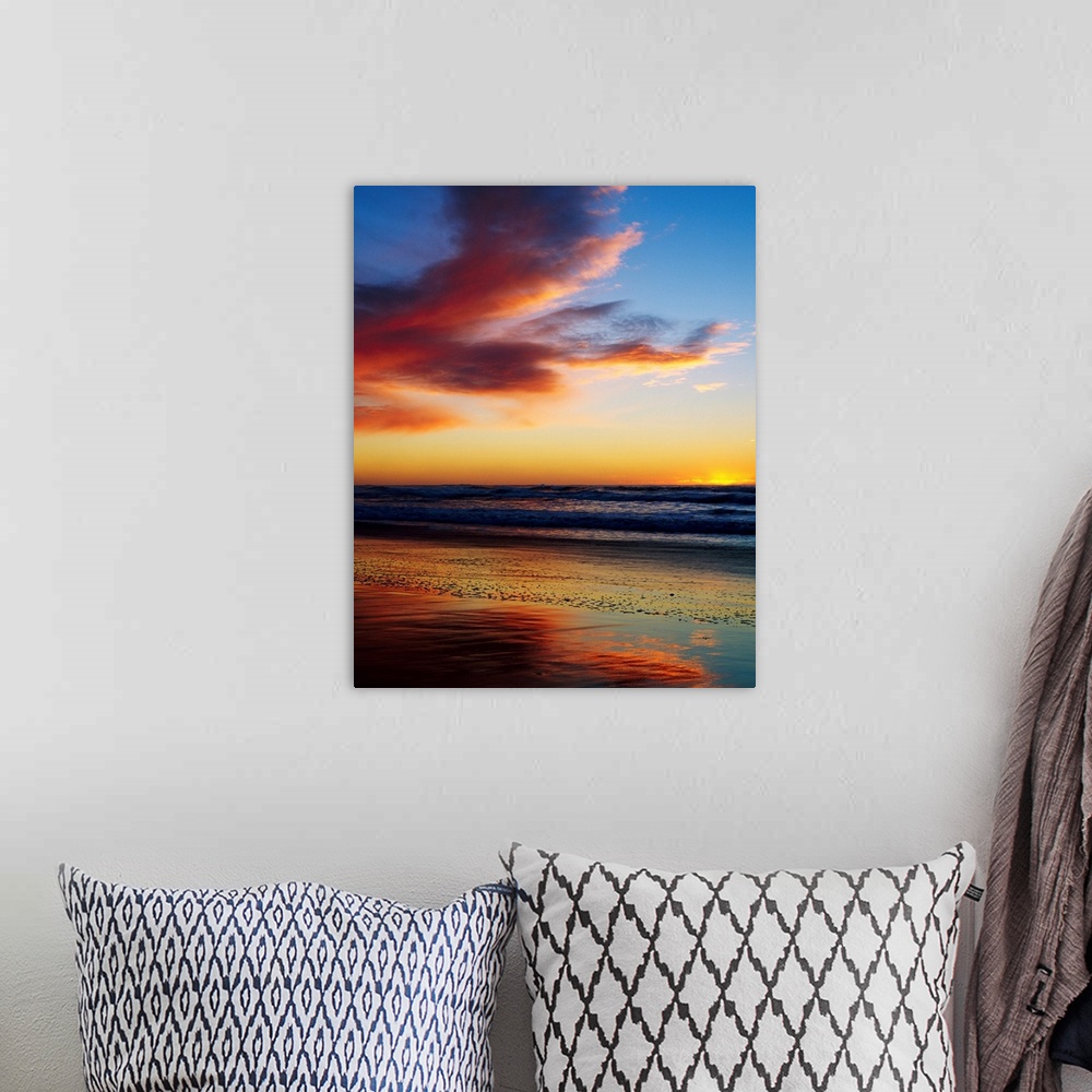 A bohemian room featuring Photograph of a cloudy beach sunset with gently rolling waves in the distant
