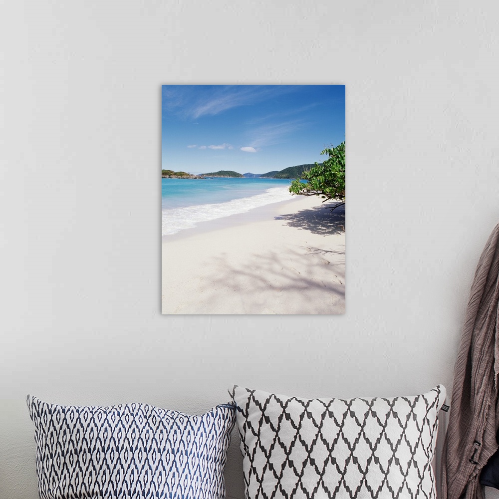 A bohemian room featuring This decorative accent is a vertical photograph of the tropical sky and sandy beach.