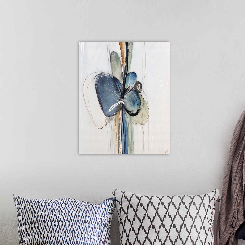 A bohemian room featuring Abstract painting of a multicolored bow stretched out vertically on a light, neutral background.