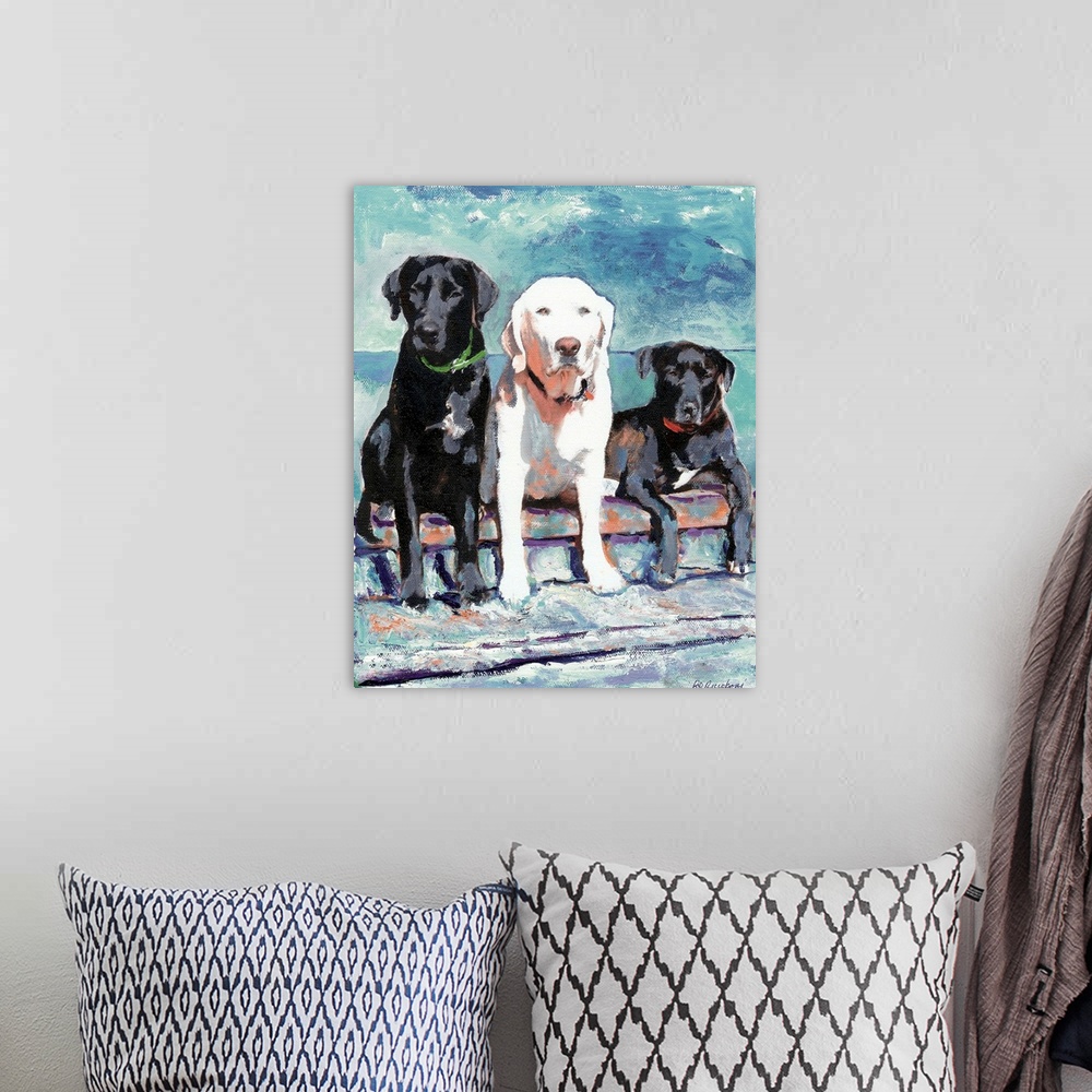 A bohemian room featuring Contemporary painting of three Labradors, two black and one white.