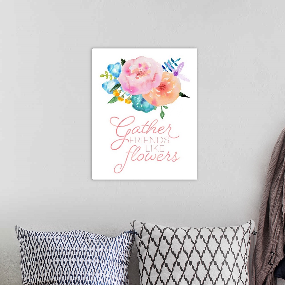 A bohemian room featuring "Gather Friends Like Flowers" in red with colorful watercolor flowers on a white background.