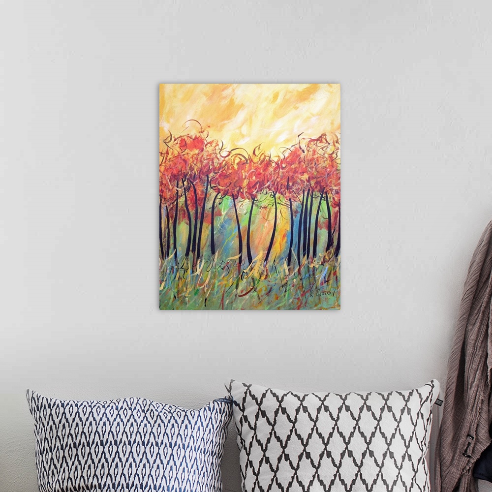 A bohemian room featuring Contemporary painting of a forest of thin trees with bright red foliage and a yellow sky above.