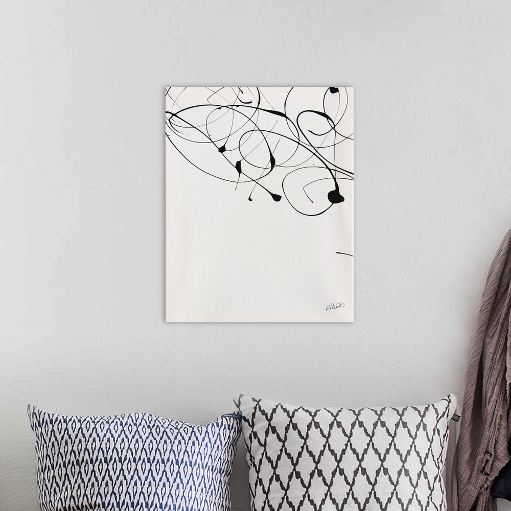 A bohemian room featuring A contemporary abstract painting of black paint drizzle on a tan background.