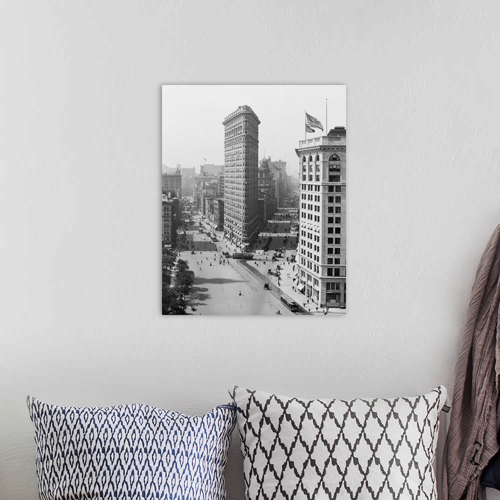 A bohemian room featuring American history photo featuring the Flatiron Building, an iconic New York City skyscraper, circa...