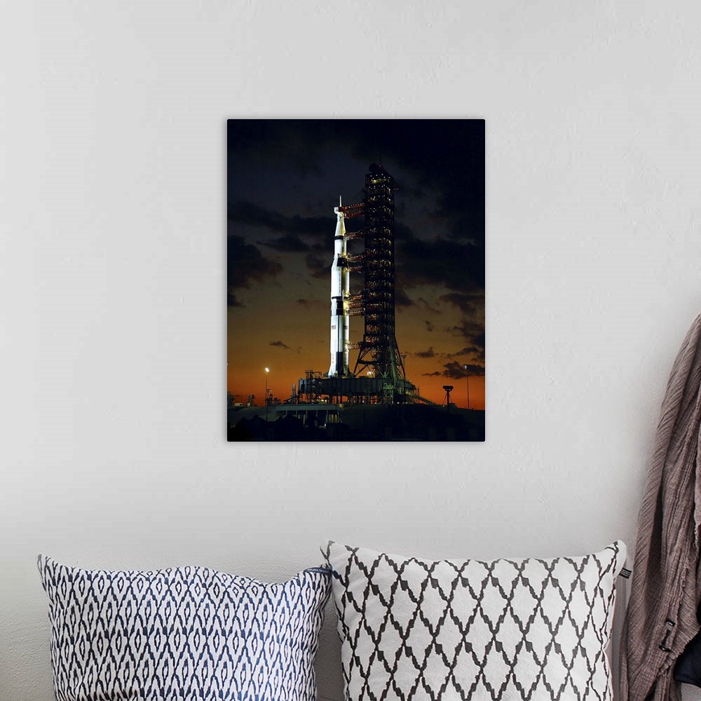 A bohemian room featuring An early morning view of the Apollo 4 Saturn V rocket at the launch complex.