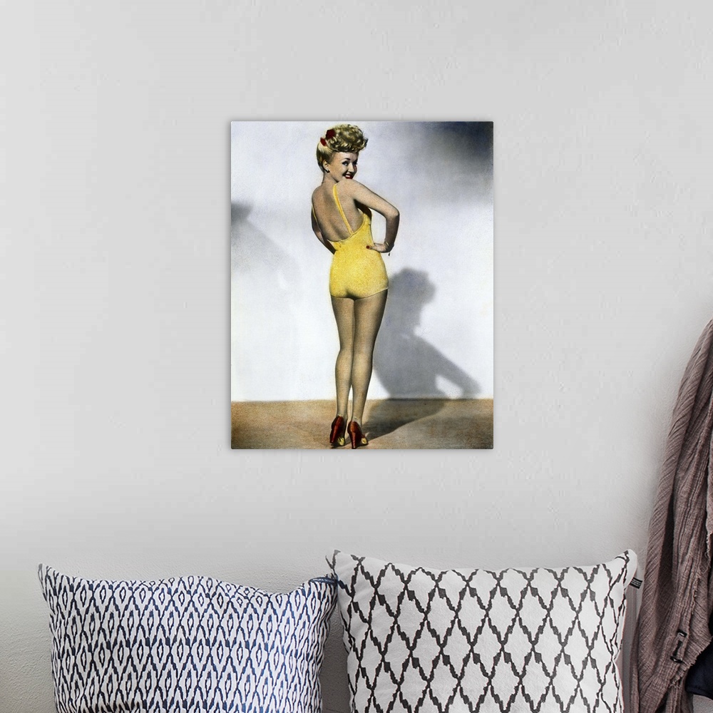 A bohemian room featuring Oil over the most popular pin-up photograph of World War II.