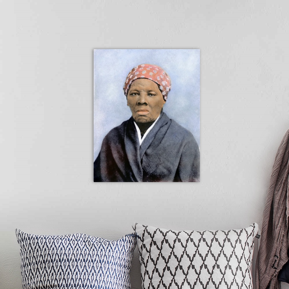 A bohemian room featuring HARRIET TUBMAN (1823-1913). American abolitionist. Oil over a photograph, 1895.
