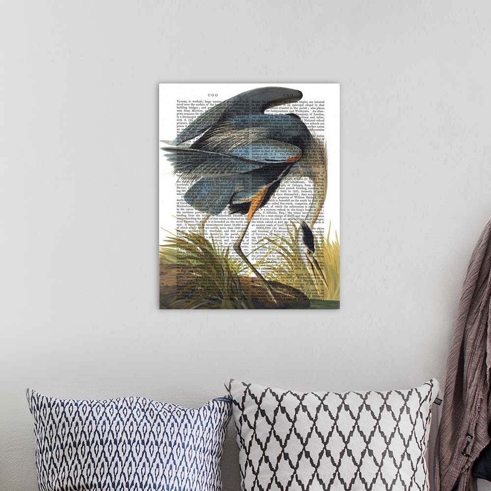 A bohemian room featuring A blue heron painted over a vintage dictionary page.