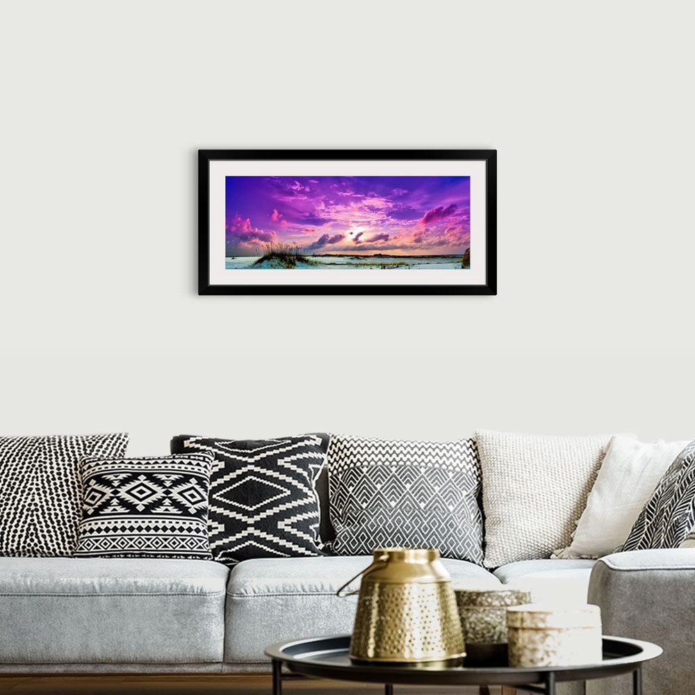 A bohemian room featuring Heavenly purple sunset skyscape panorama.