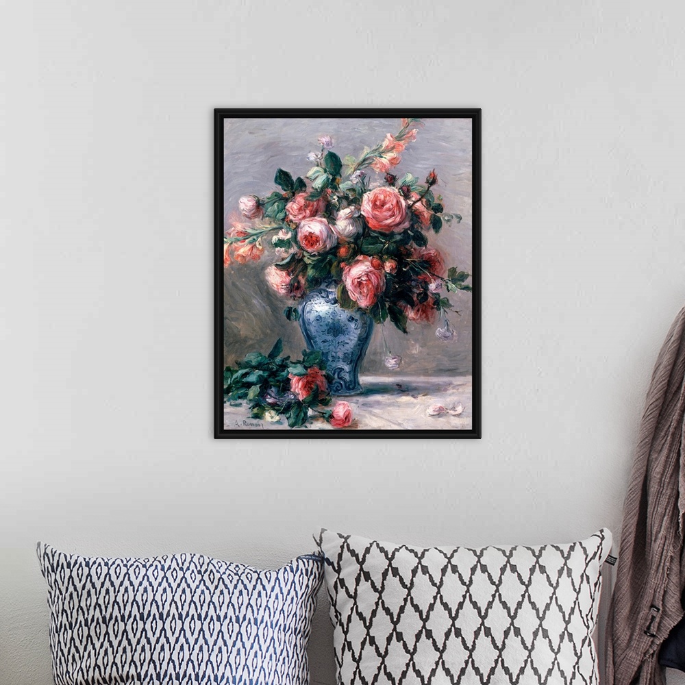 A bohemian room featuring Big classic art depicts an arrangement of flowers within a decorated container sitting on the gro...