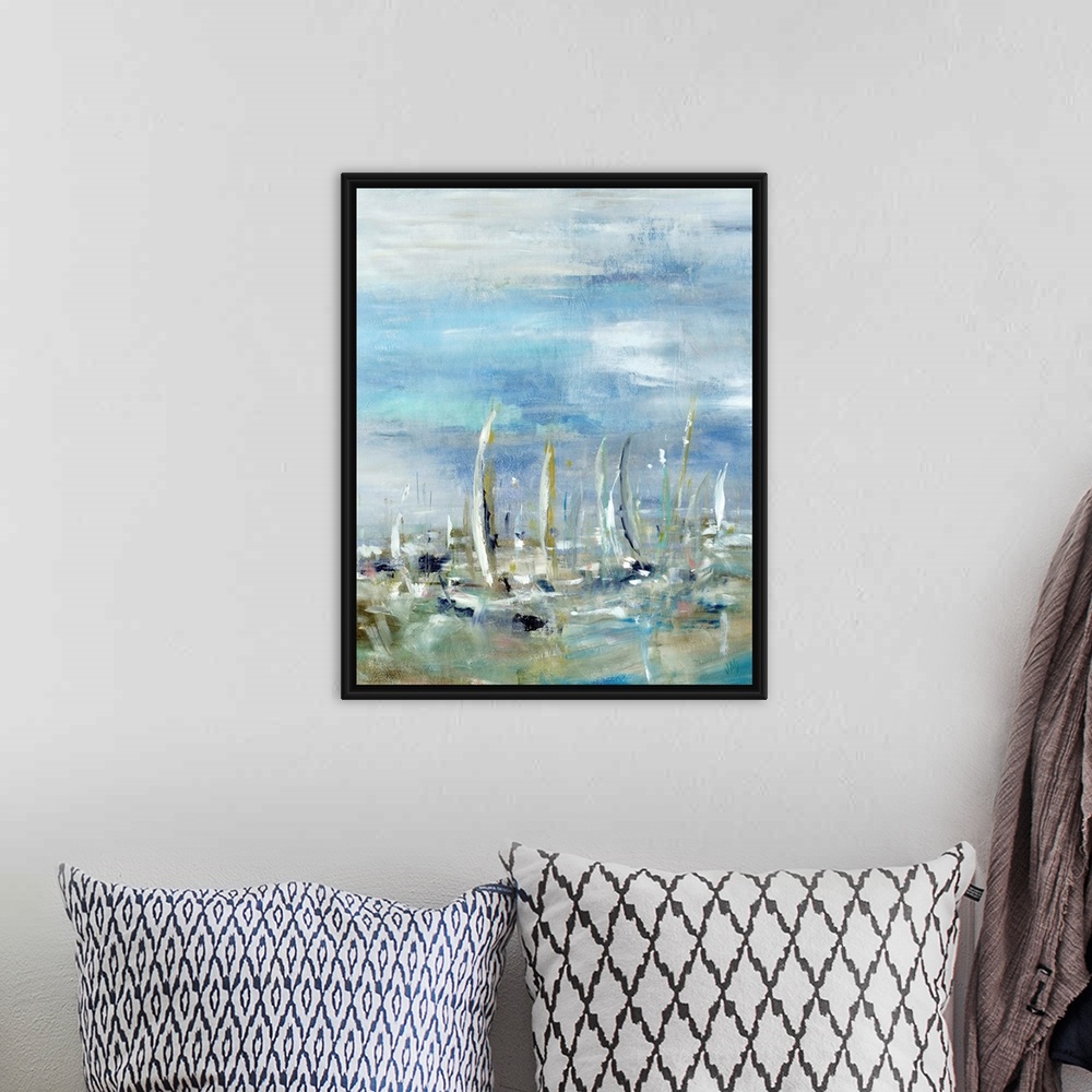 A bohemian room featuring Abstract painting of sailboats in the ocean on a cloudy day.  The boat shapes are created from va...