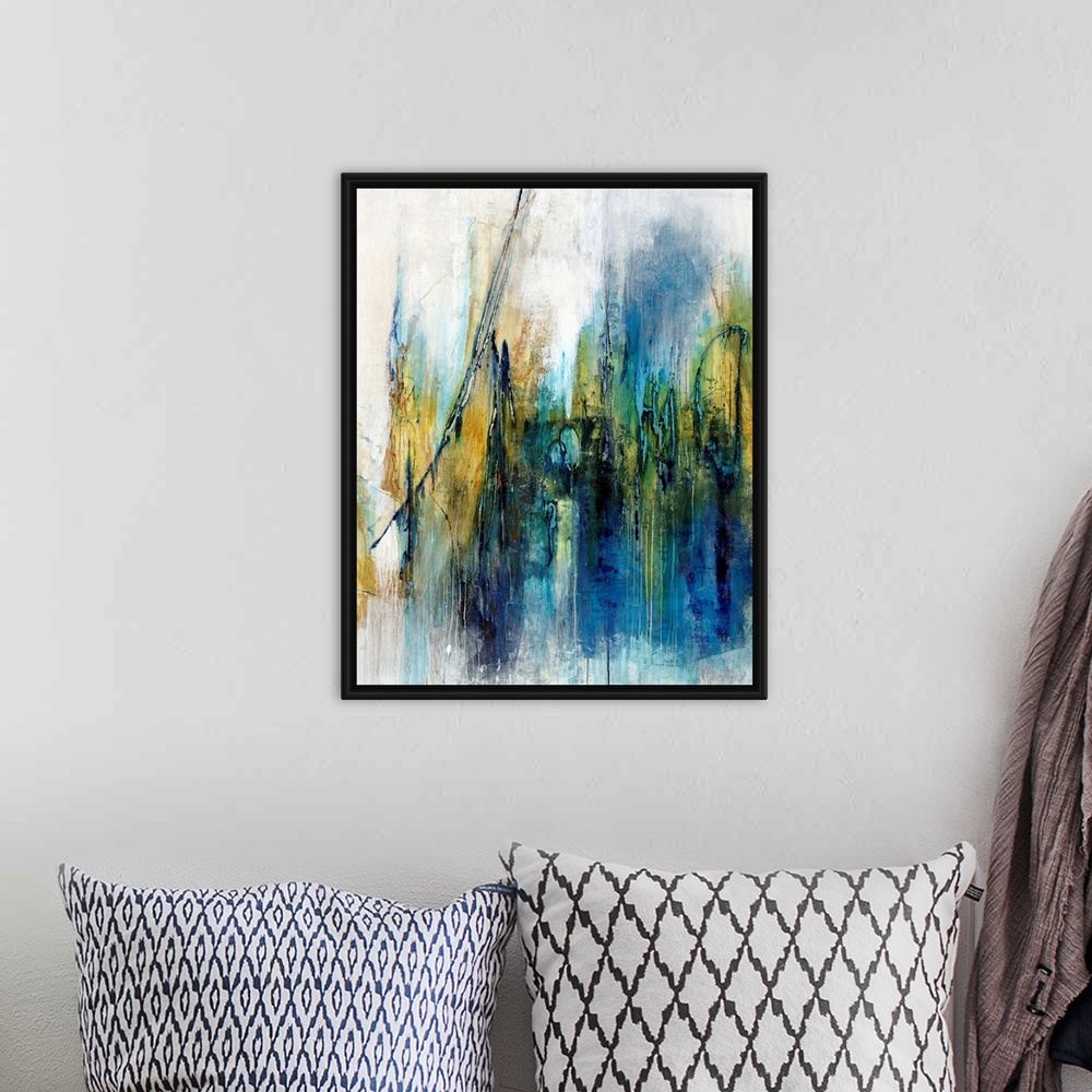 A bohemian room featuring Contemporary abstract painting using blue mixed with gold in swiping vertical swipes, against a n...