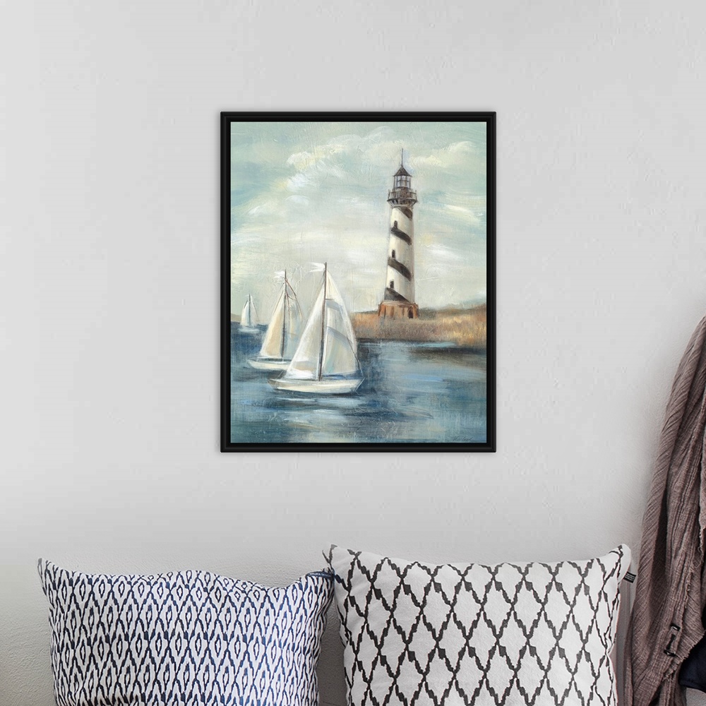 A bohemian room featuring Contemporary painting of an idyllic coastal scene, with a lighthouse in the background and sailbo...